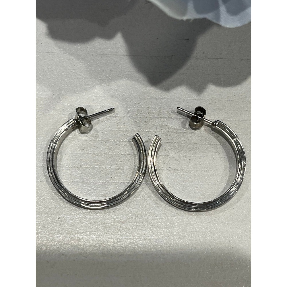 Silver toned 1" pierced Earrings